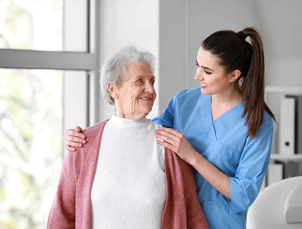 Photo of home healthcare workers providing care.